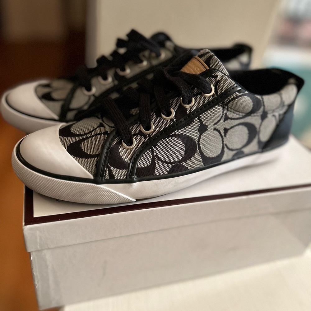 Fairly new Coach sneakers. Great condition. Classic Coach.